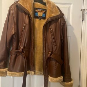 Wilson’s 100% Women’s leather Jacket. Size Large. Fur lined. Burgundy in color.